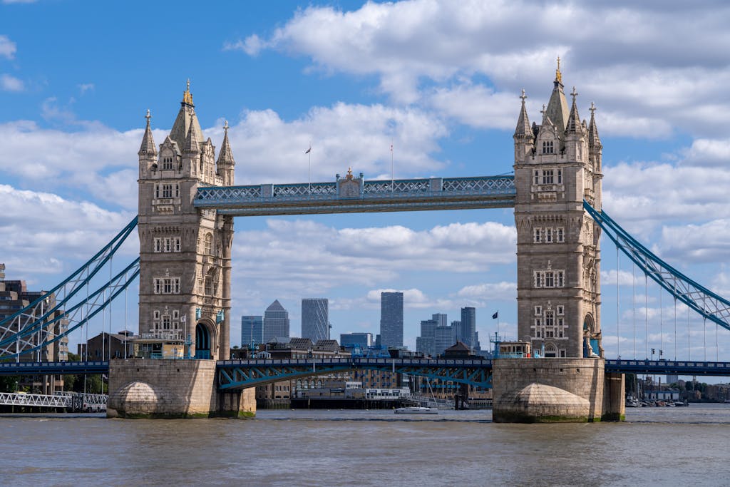 Iconic Tower Bridge over the River Thames in London on a clear day with blue skies.