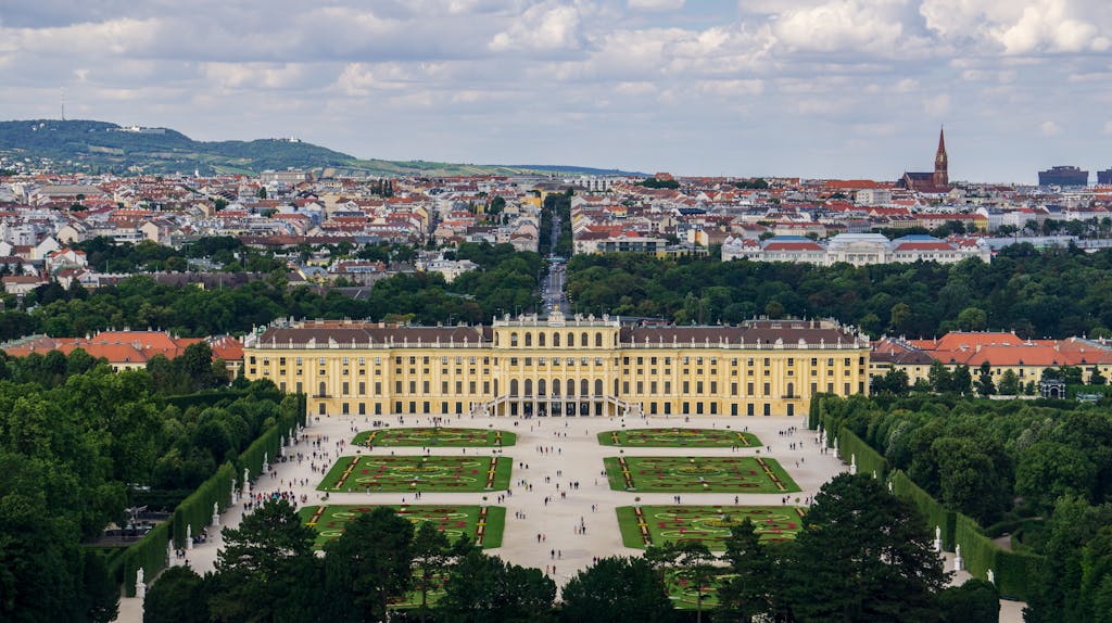 Scenic aerial shot of Schönbrunn Palace and gardens in Vienna, Austria.
